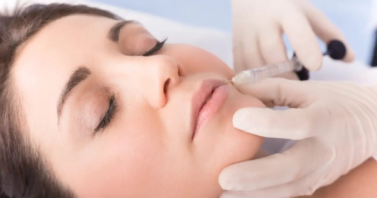 A woman getting a lip filler injection in St Petersburg